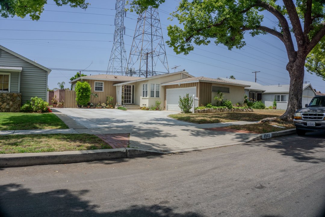 American History X|2206 Meade Place — The House, and the Curb Outside It