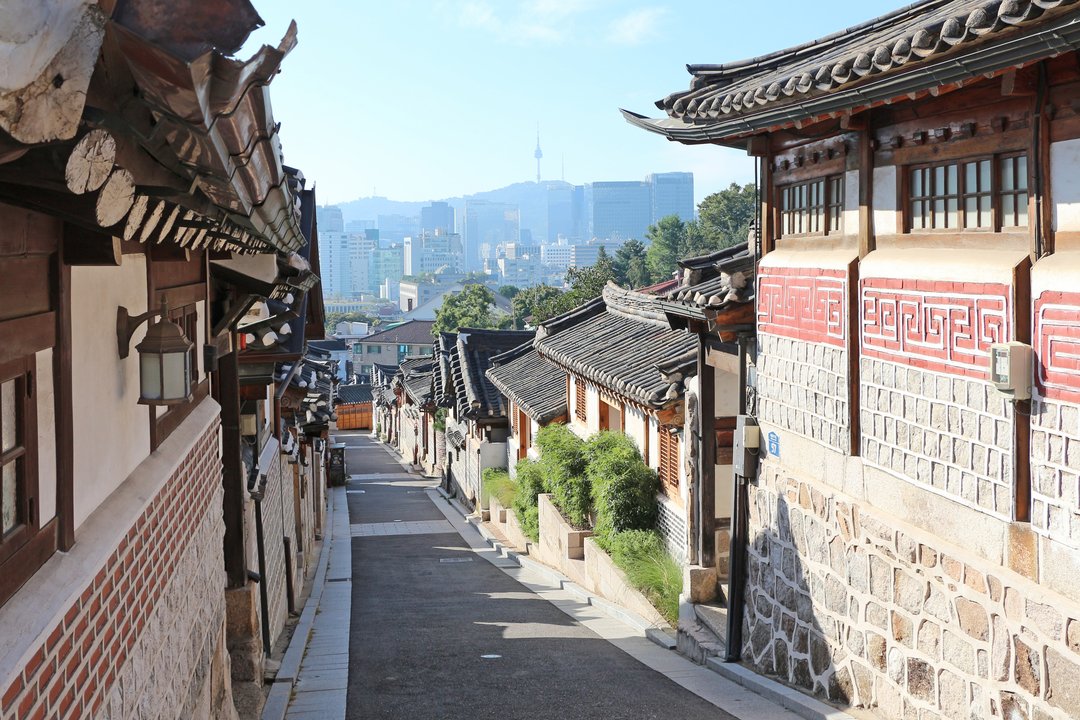 Heartstrings | Bukchon Hanok Village — The Roof Line Behind the Gayageum Student