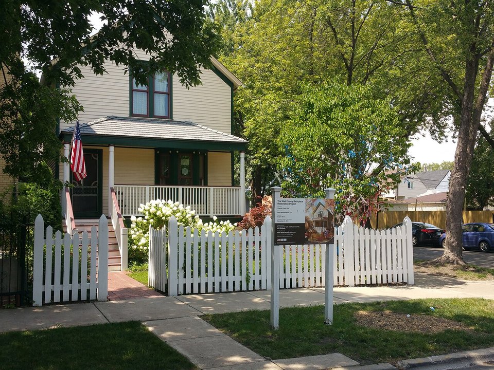 Biography | Walt Disney — Born Upstairs in the Cottage His Parents Built on Tripp Avenue