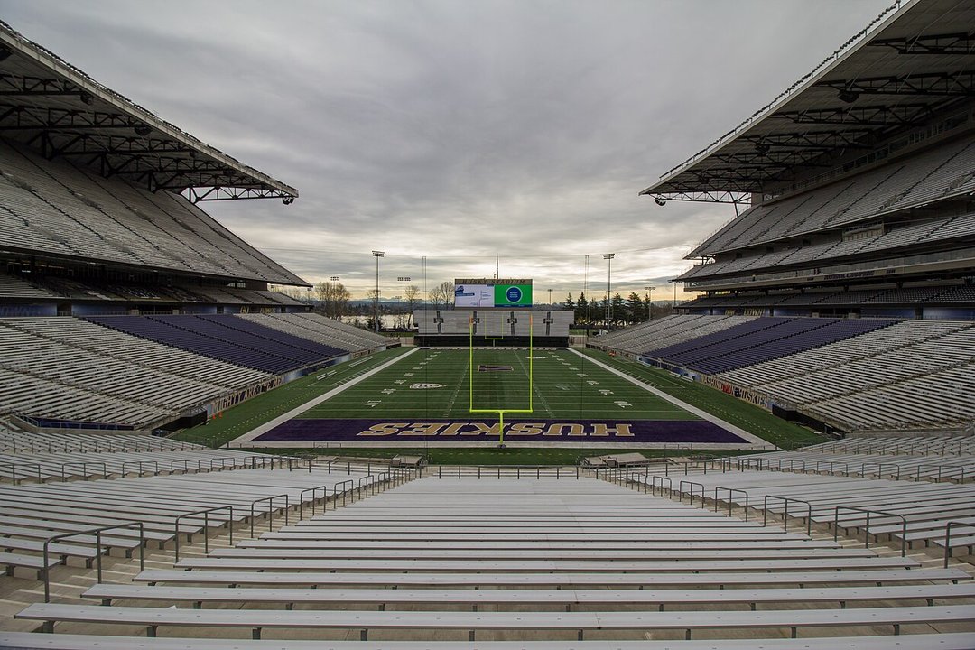 21 & Over | Husky Climbing Rock — The night pep rally below the stadium