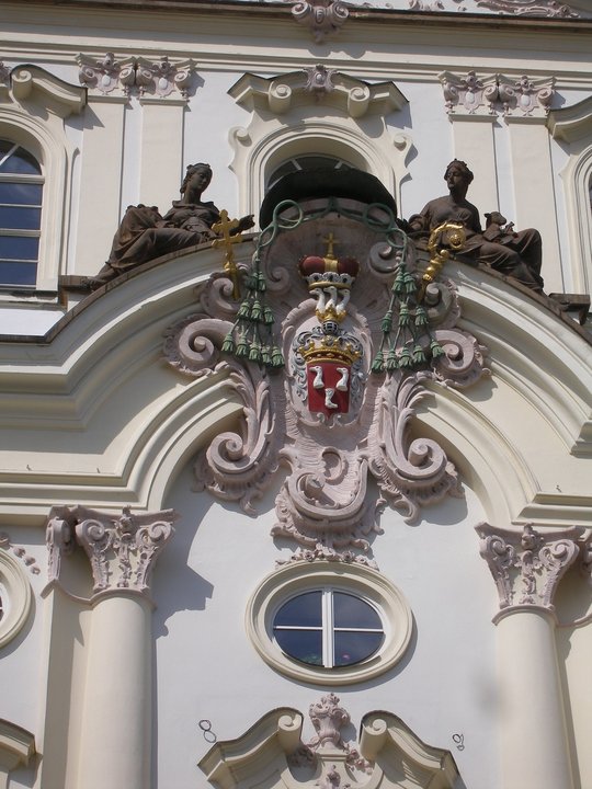 Amadeus | Archbishop's Palace, Hradčanské náměstí — the Emperor's court in rococo cream