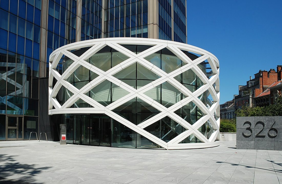 Biography|Christophe De Vusser — The Blue Tower on Avenue Louise Where He Joined Bain
